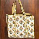 MONOGRAM BLOCK PRINT QUILTED OVERSIZED TOTE YELLOW PRINT