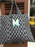 MONOGRAM BLOCK PRINT QUILTED OVERSIZED TOTE BLACK PRINT