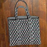 MONOGRAM BLOCK PRINT QUILTED OVERSIZED TOTE BLACK PRINT
