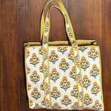 MONOGRAM BLOCK PRINT QUILTED OVERSIZED TOTE YELLOW PRINT