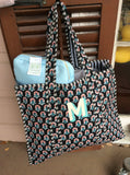 MONOGRAM BLOCK PRINT QUILTED OVERSIZED TOTE BLACK PRINT