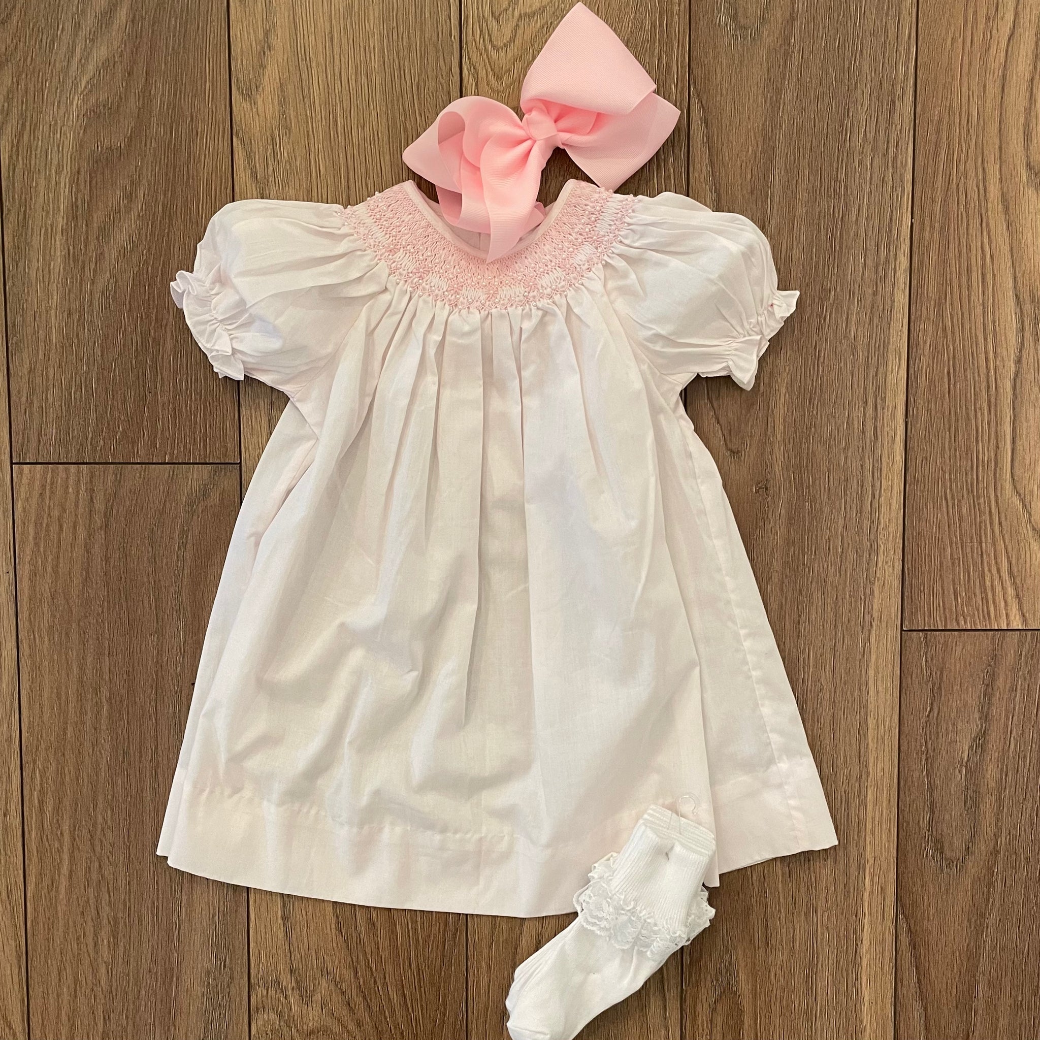 SMOCKED BISHOP DRESS SOFT PINK Orient Expressed SMOCKED BISHOP DRESS SOFT PINK Orient Expressed
